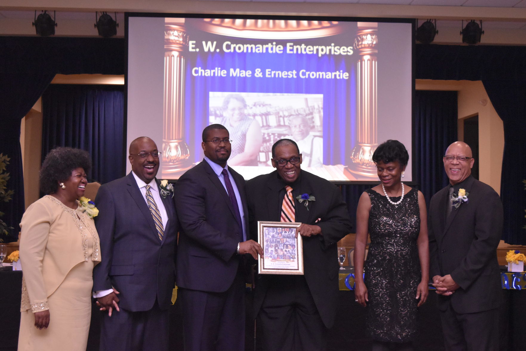E.W. Cromartie, II (right) and E.W. Cromatie, III accepts Legacy Award for The Cromartie Enterprises.